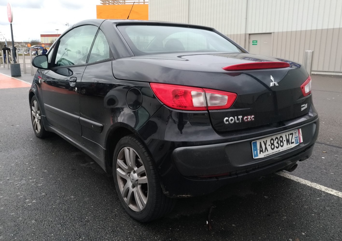 Rear view of a compact convertible with distinct taillights and sporty design