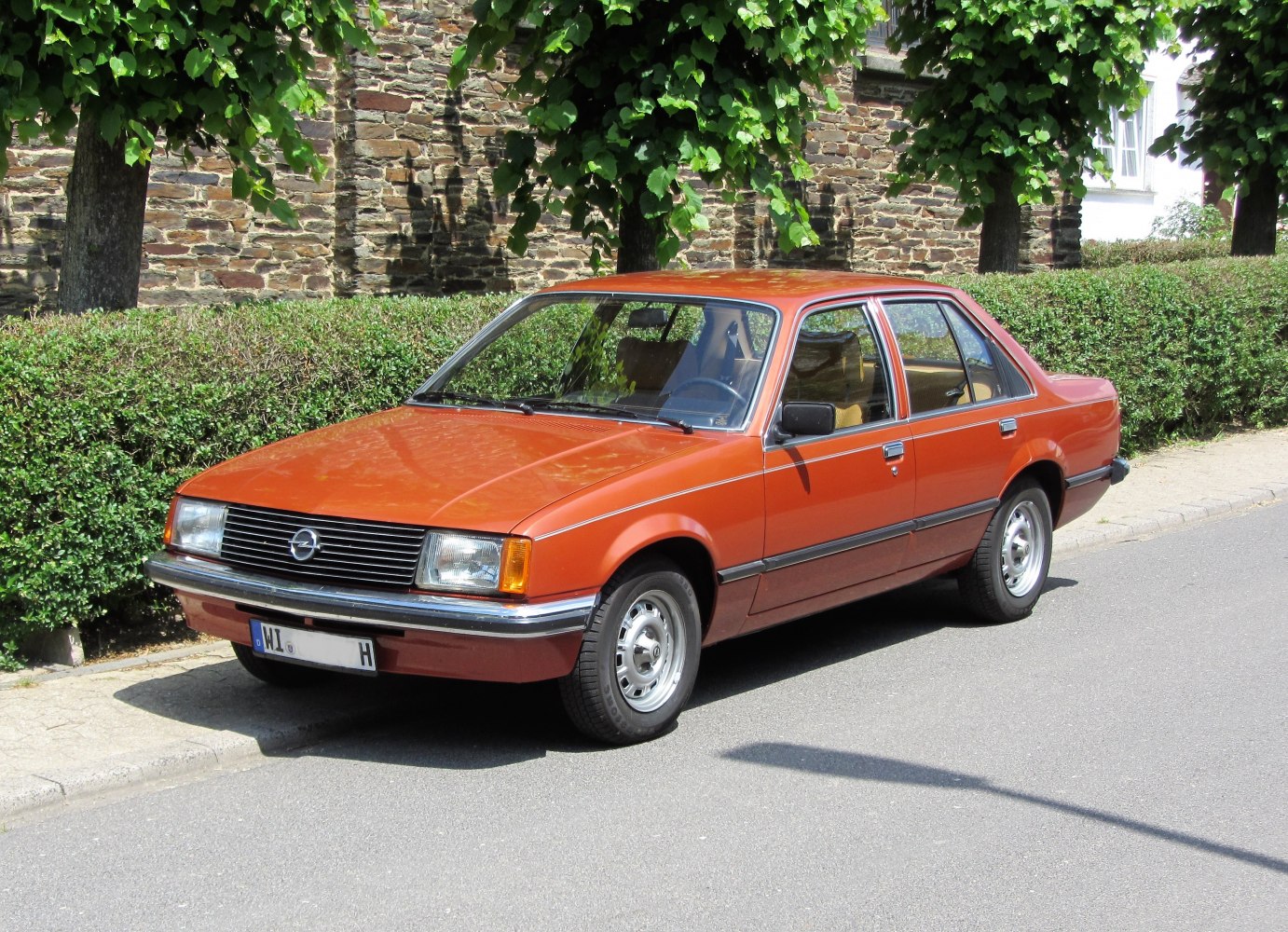 Vintage sedan with steel wheels and classic front grille design