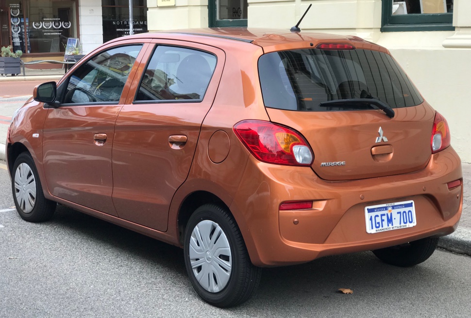 Rear three-quarter hatchback with distinct taillights and smooth panel design