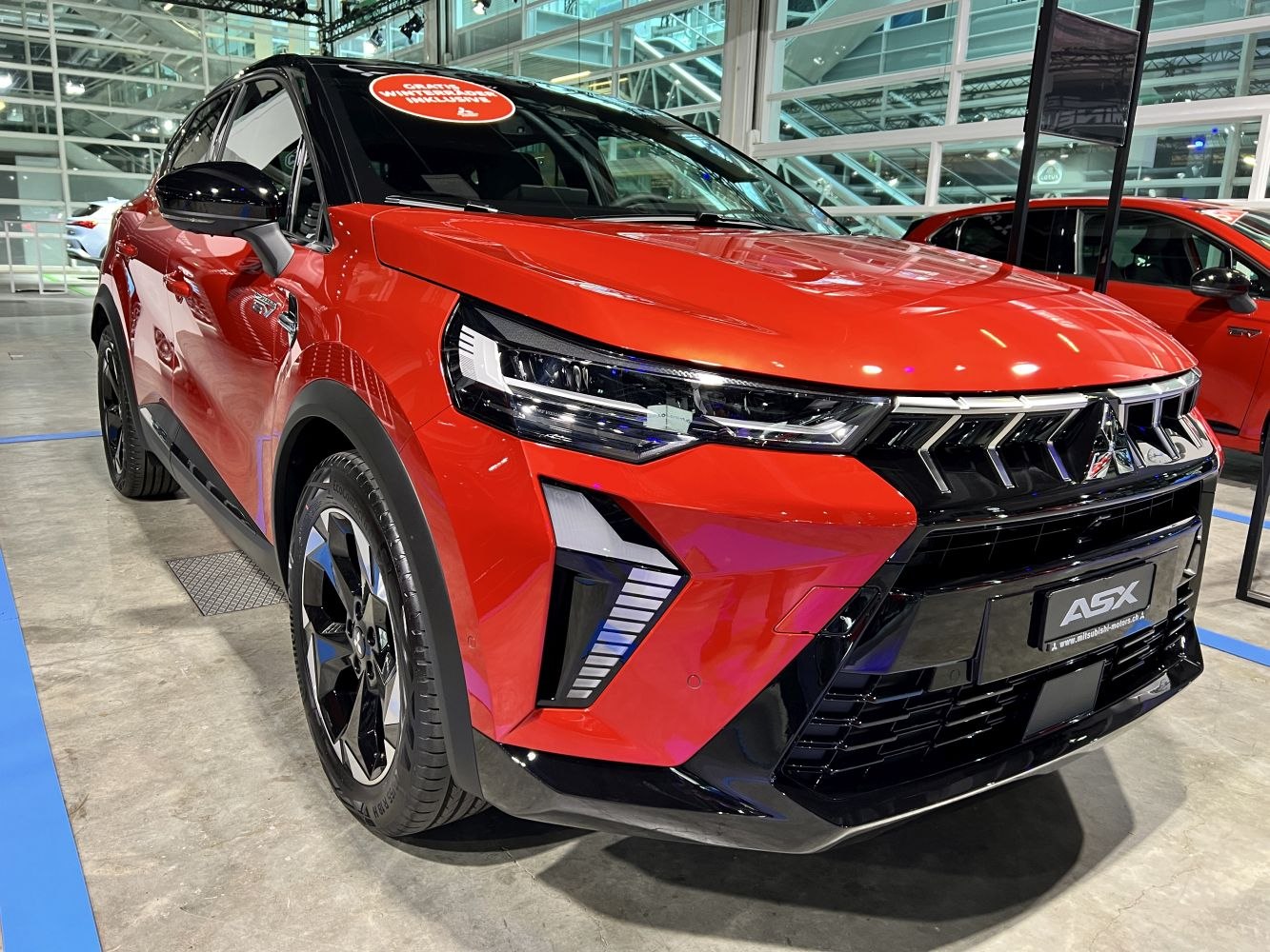 Striking front view with LED headlights and bold grille design