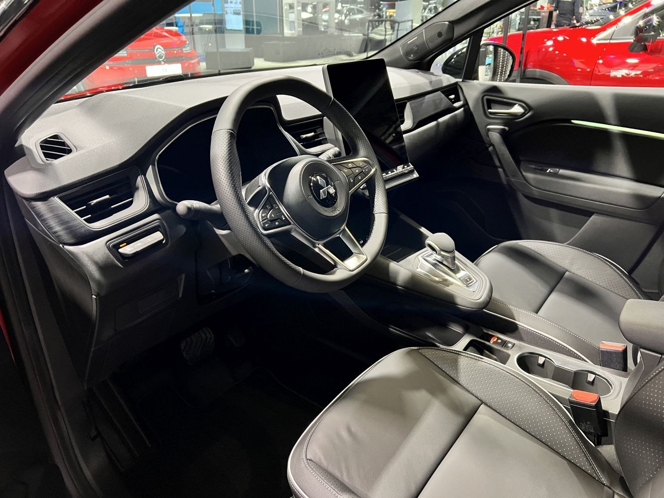Modern dashboard with touchscreen and multifunction steering wheel