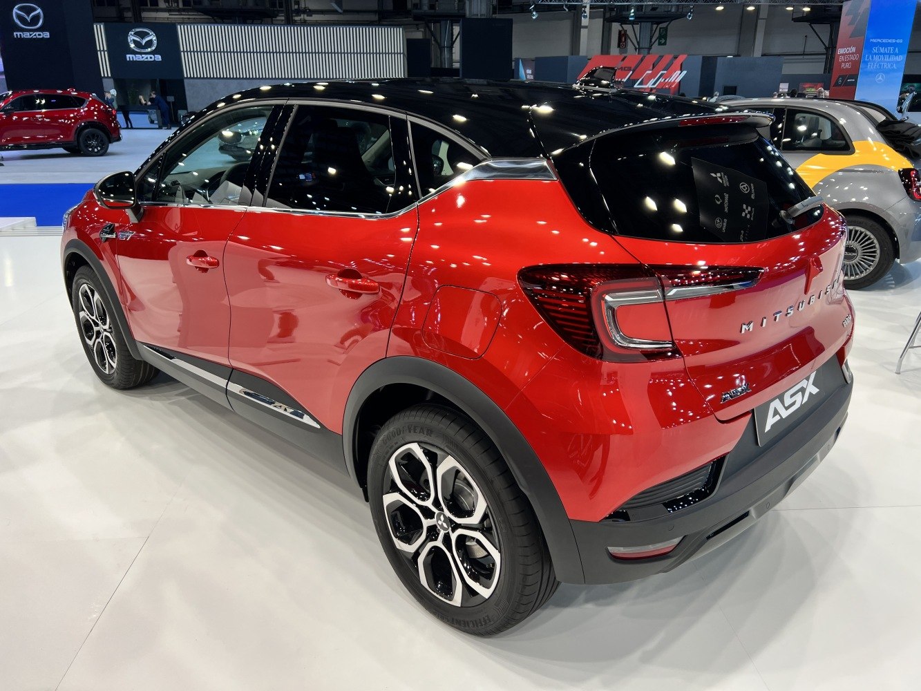 Rear and side profile of compact SUV with dual-tone paint and modern alloy wheels