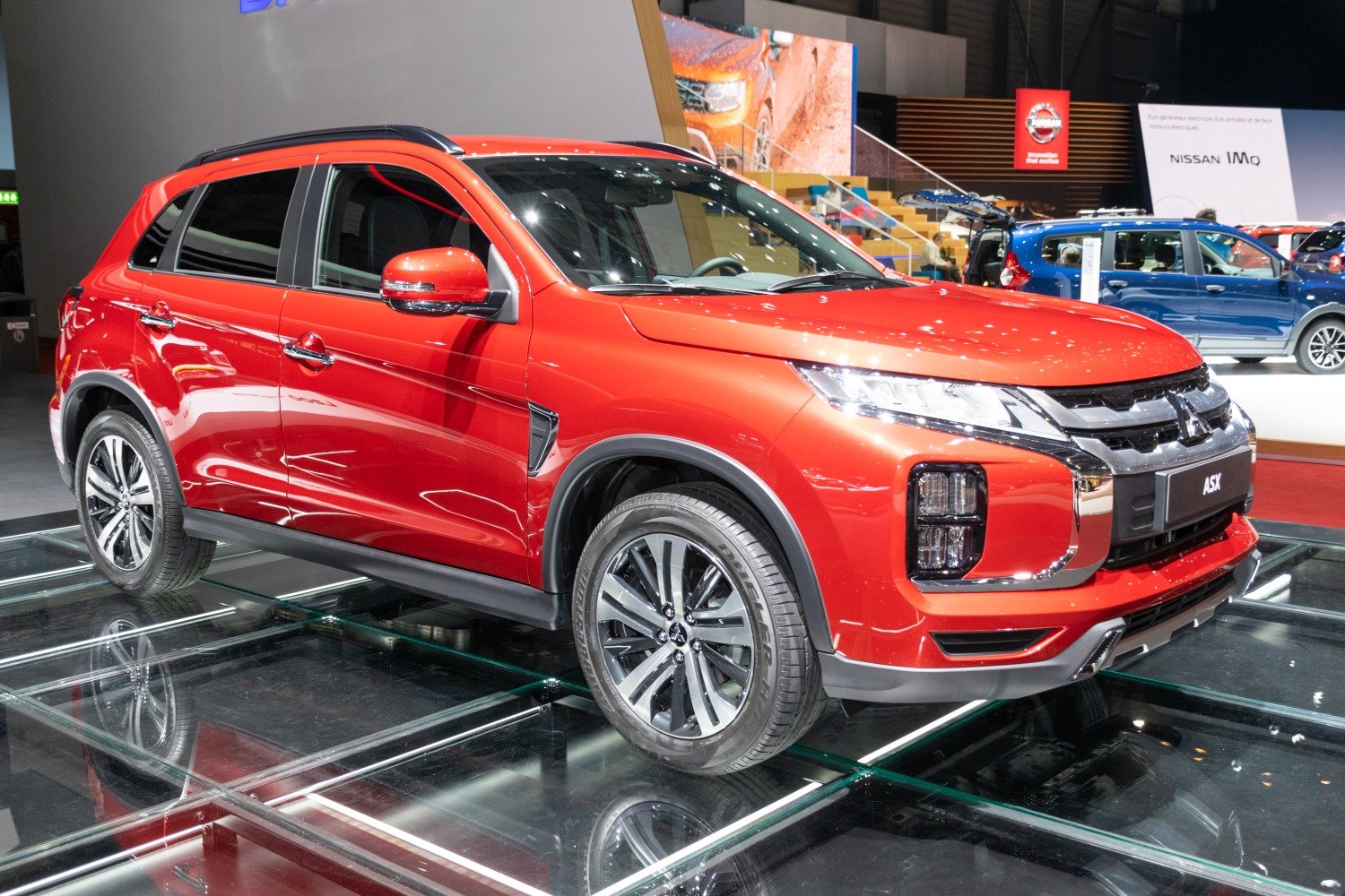 Front side view of a modern compact SUV with LED headlights and alloy wheels