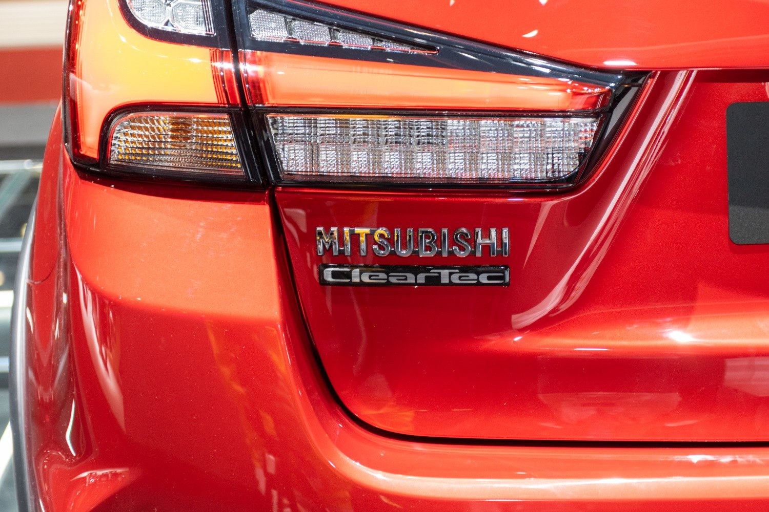 ClearTec badge and rear light cluster on red vehicle rear