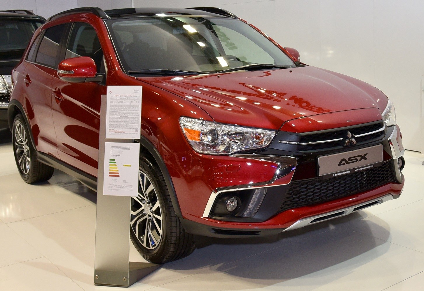 Front view with LED headlights and modern grille