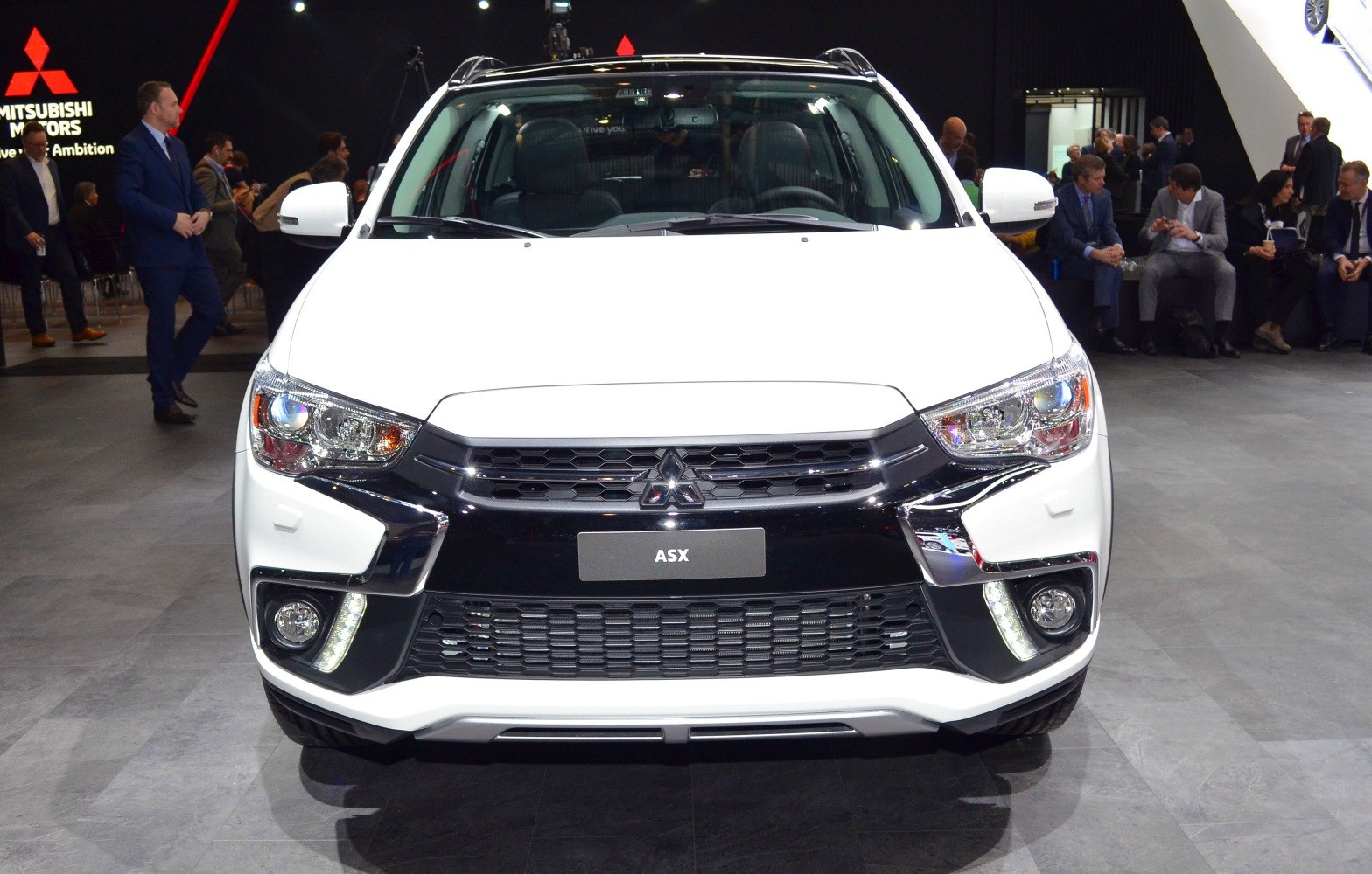 Front grille, headlights, and fog lights of a modern SUV