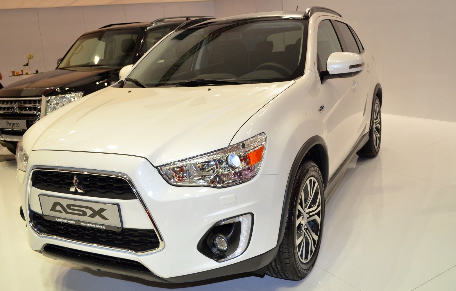 Front grille and headlights close-up on white SUV