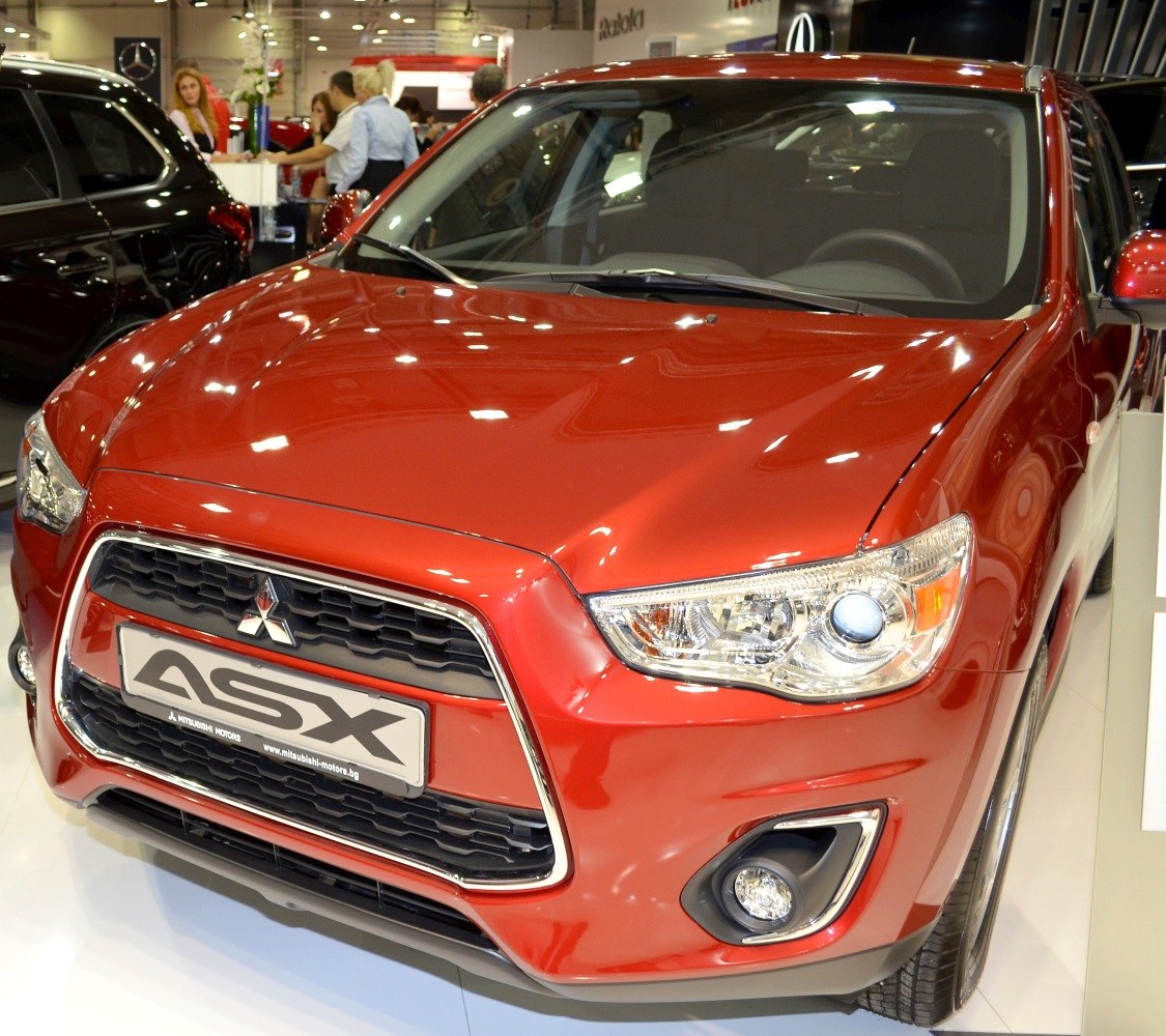 Front grille and headlight detail of a compact SUV.