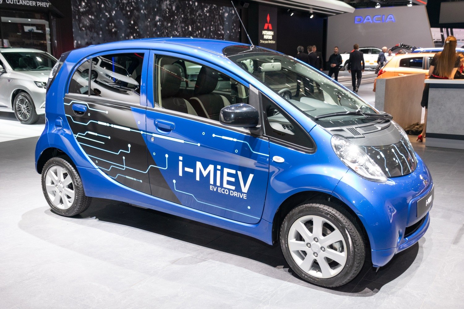 Compact electric hatchback with circuit-inspired side graphics and aerodynamic shape