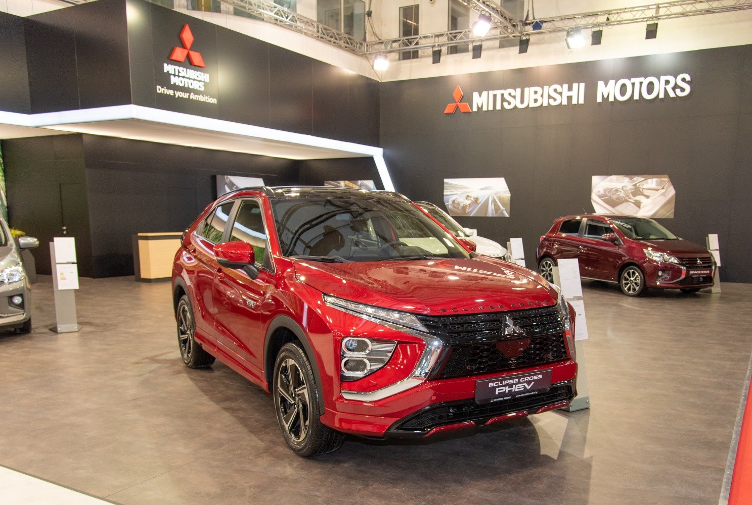 Red SUV front and side view with distinctive grille and headlight design
