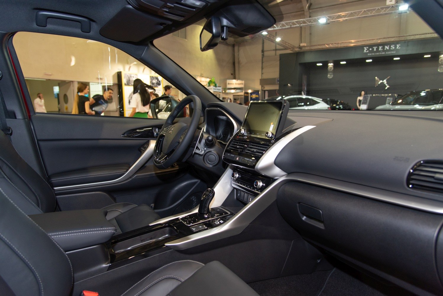 Modern car interior with touchscreen display and automatic gear lever
