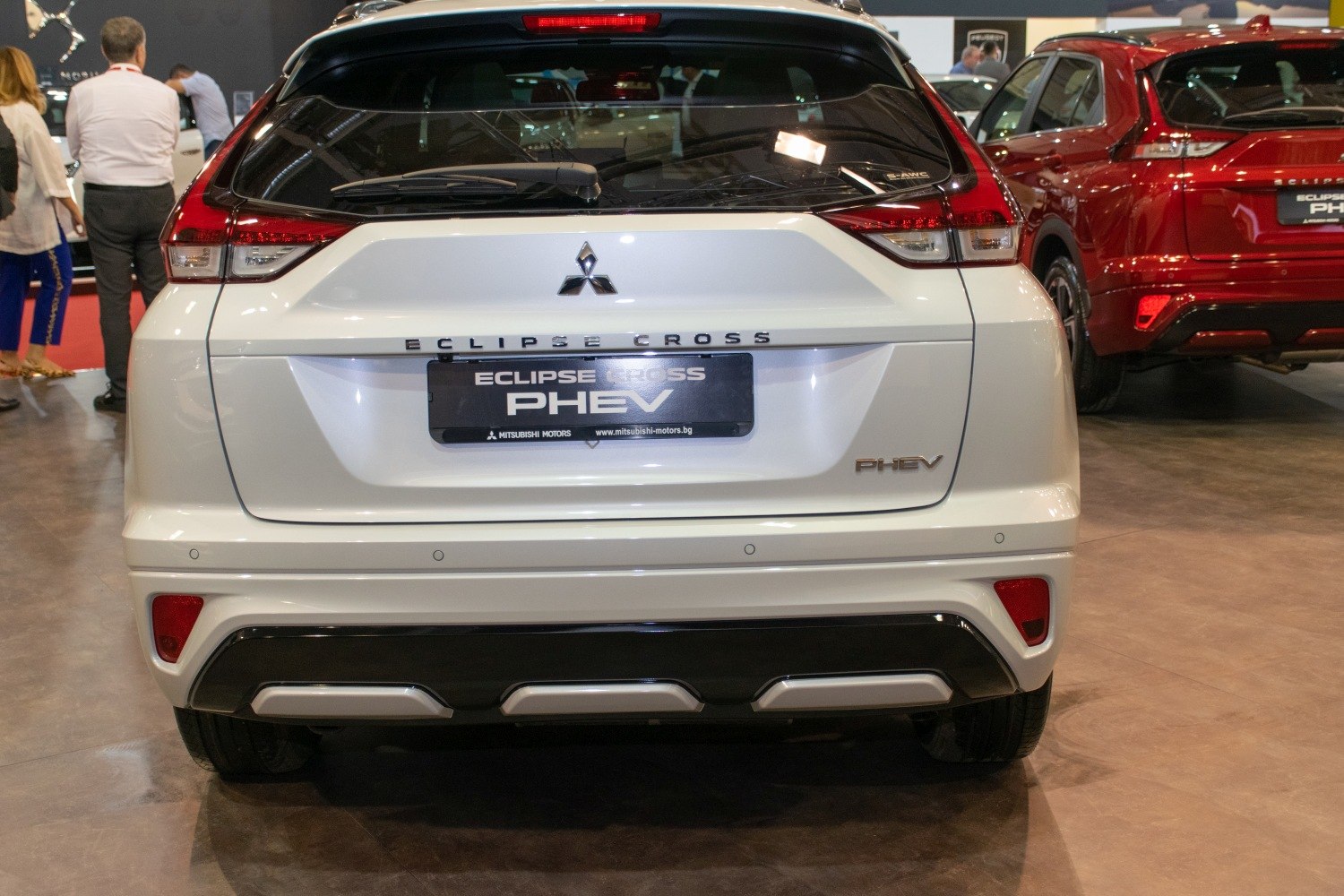 Rear view of a facelifted SUV with PHEV branding and modern tail light design