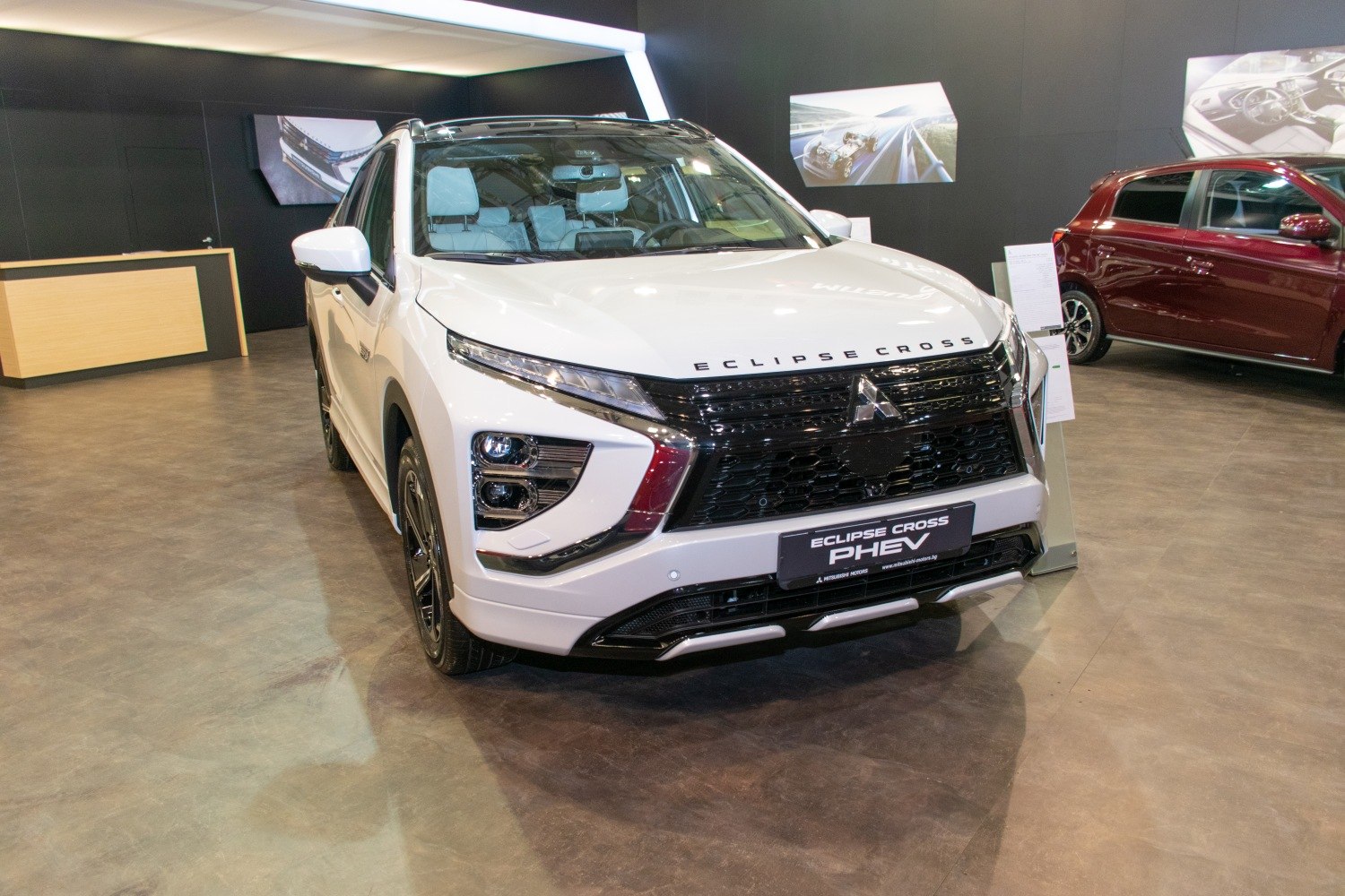 Front view showing aggressive grille and LED headlights