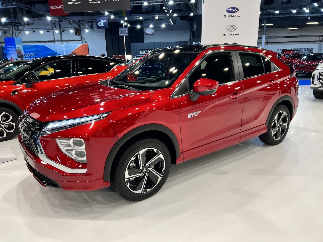 Red electric SUV with sleek front and bold side profile