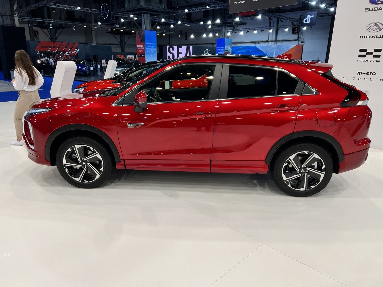 Side profile of red SUV with modern alloy wheels and sleek design