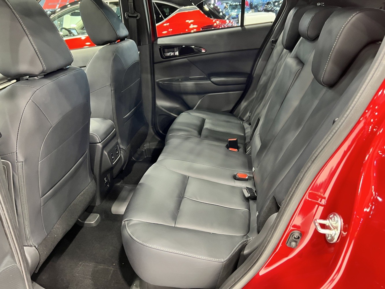 Rear black leather seats and rear passenger cabin interior
