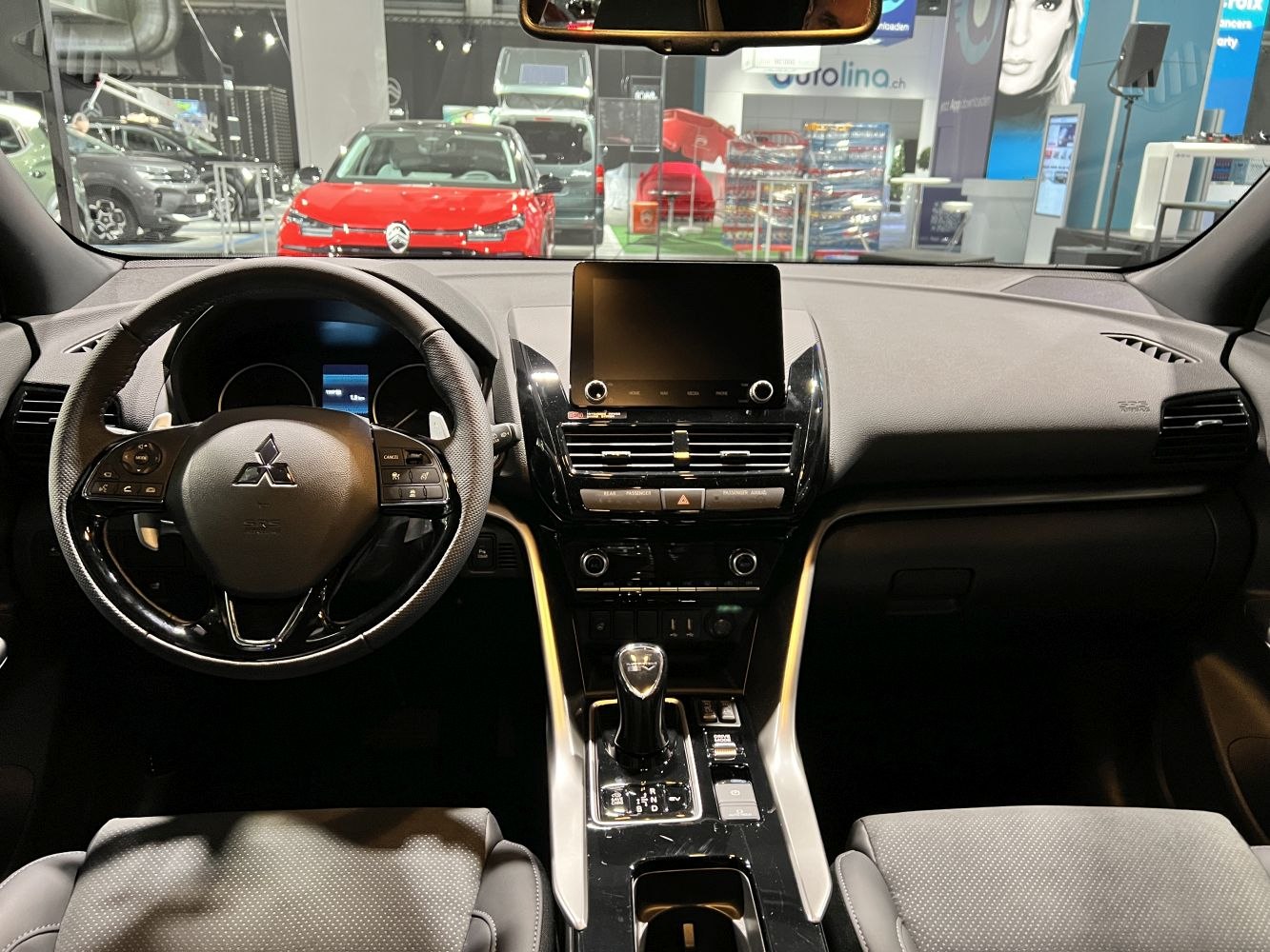 Modern car interior with touchscreen and multifunction steering wheel