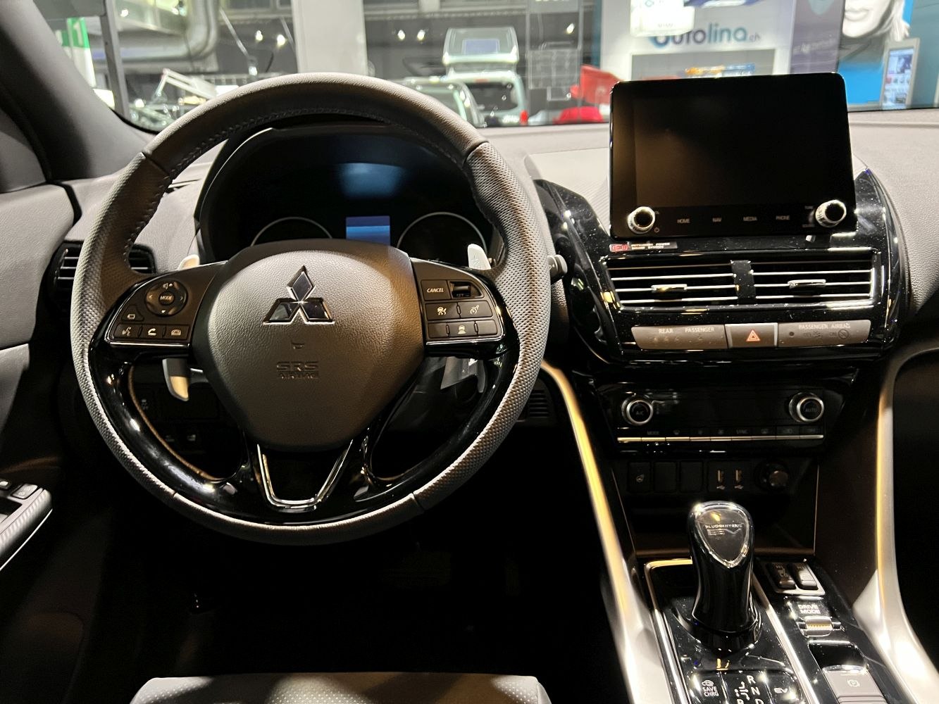 Steering wheel with controls and center console touchscreen dashboard