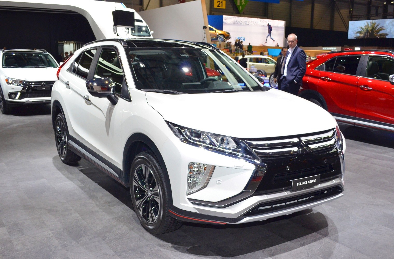Front view of white SUV with LED headlights and chrome grille