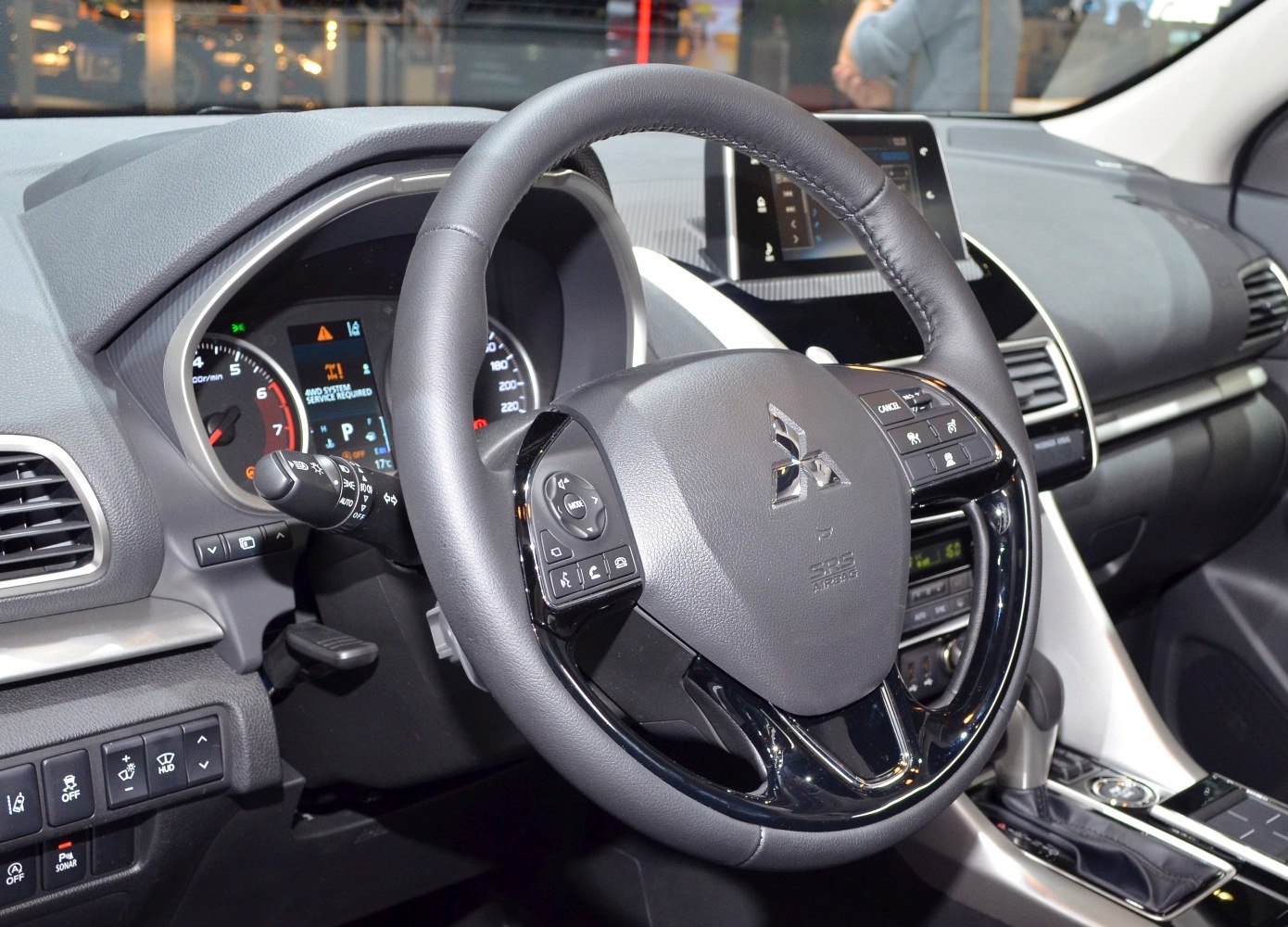 Steering wheel with controls and dashboard instrument cluster