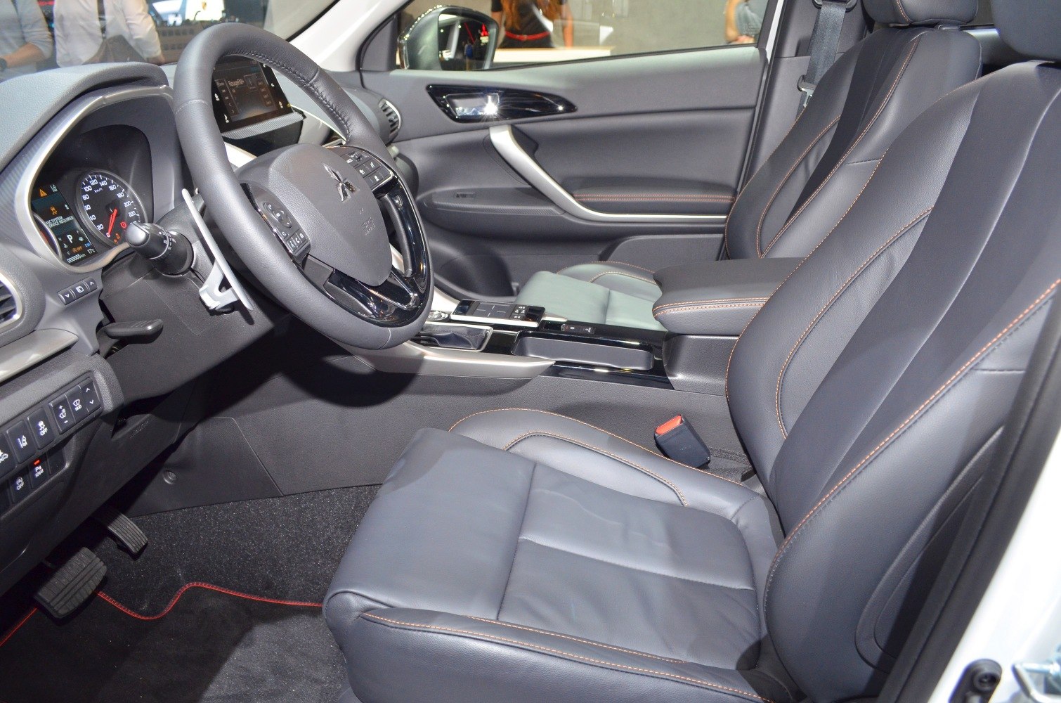 Leather seats and modern dashboard layout with steering wheel controls
