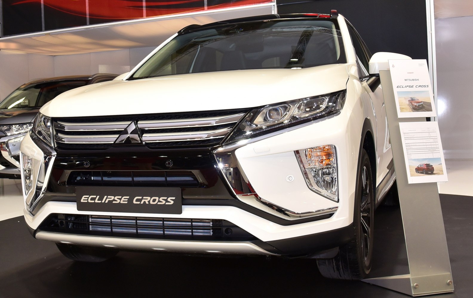 Front grille and headlights with chrome accents on an SUV