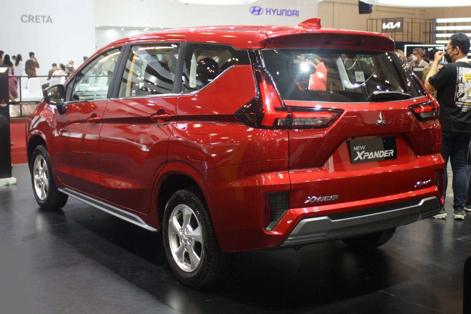 Rear and side view with distinctive tail lights and body design