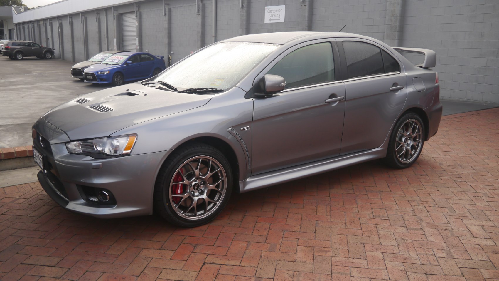 Aerodynamic styling with sporty alloy wheels and rear spoiler