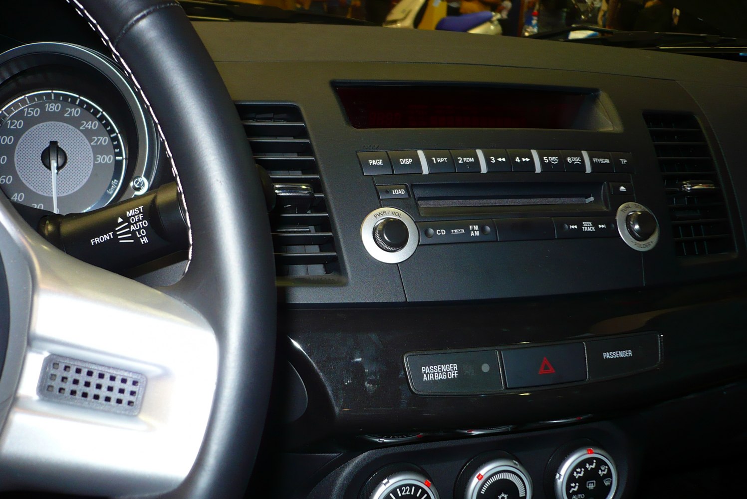 Dashboard, steering wheel, audio controls, climate dials
