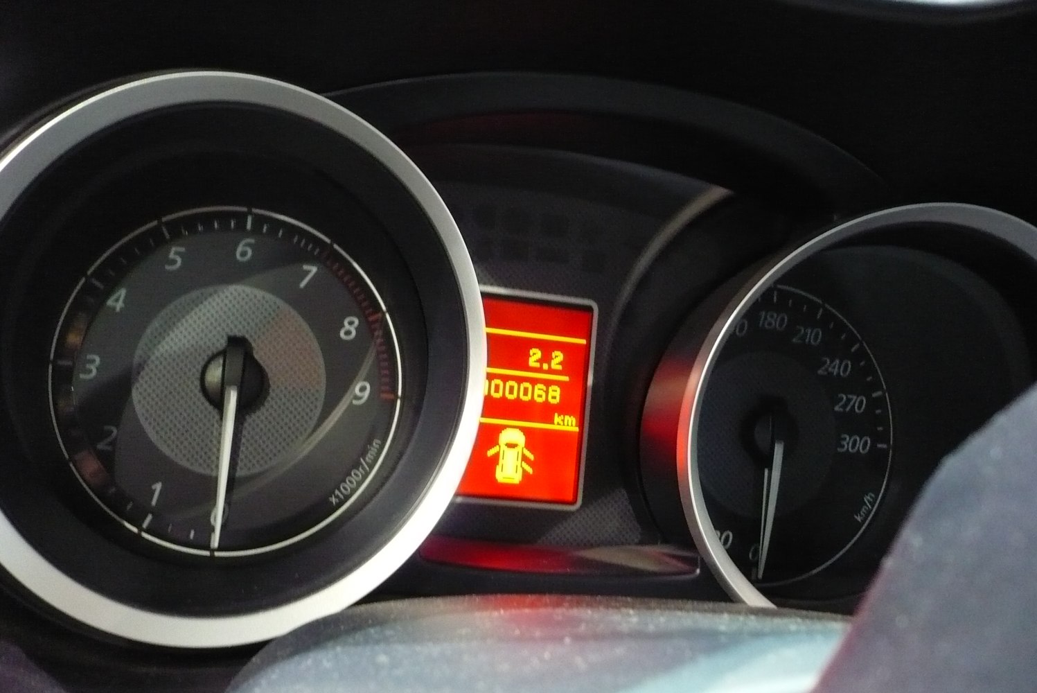 Tachometer, digital odometer, door open indicator, and speedometer cluster