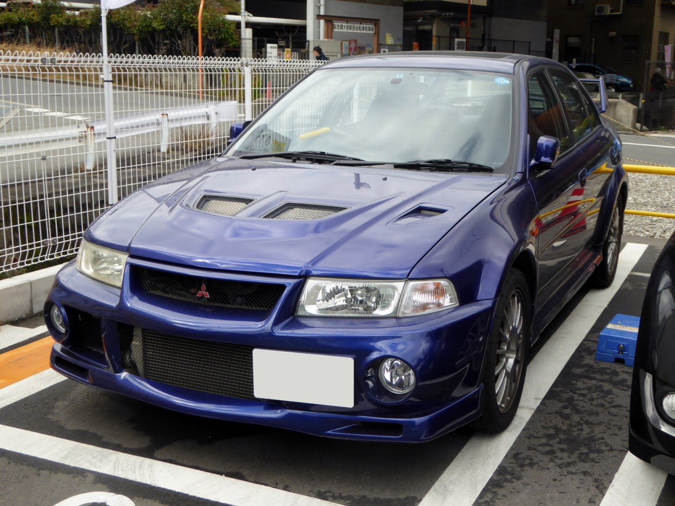 Front view with hood vents and aggressive bumper