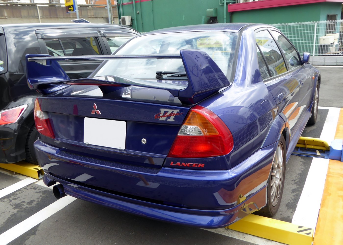 Prominent rear wing and distinctive taillight design