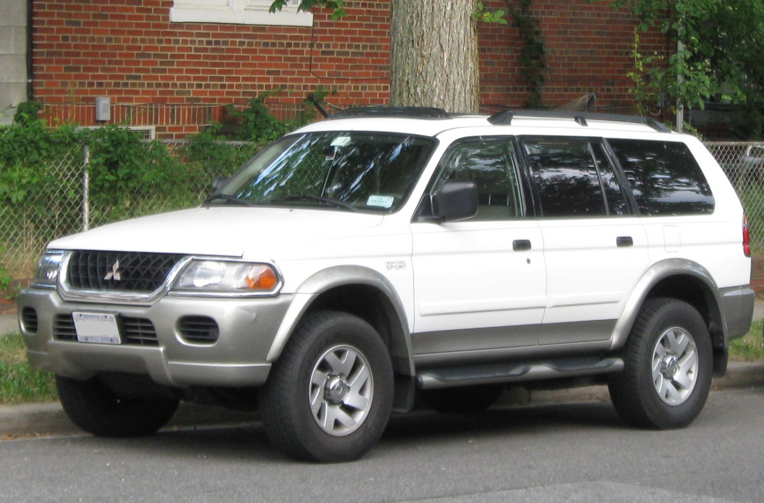 Off-road SUV with roof rails and distinct front grille