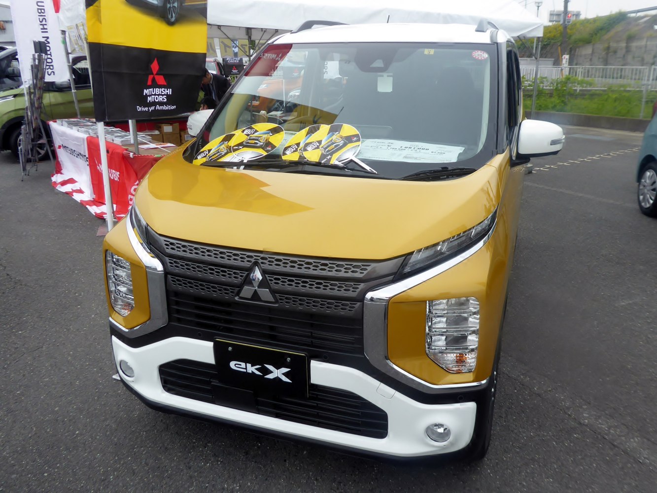 Close-up of front grille and LED headlights with fog lights