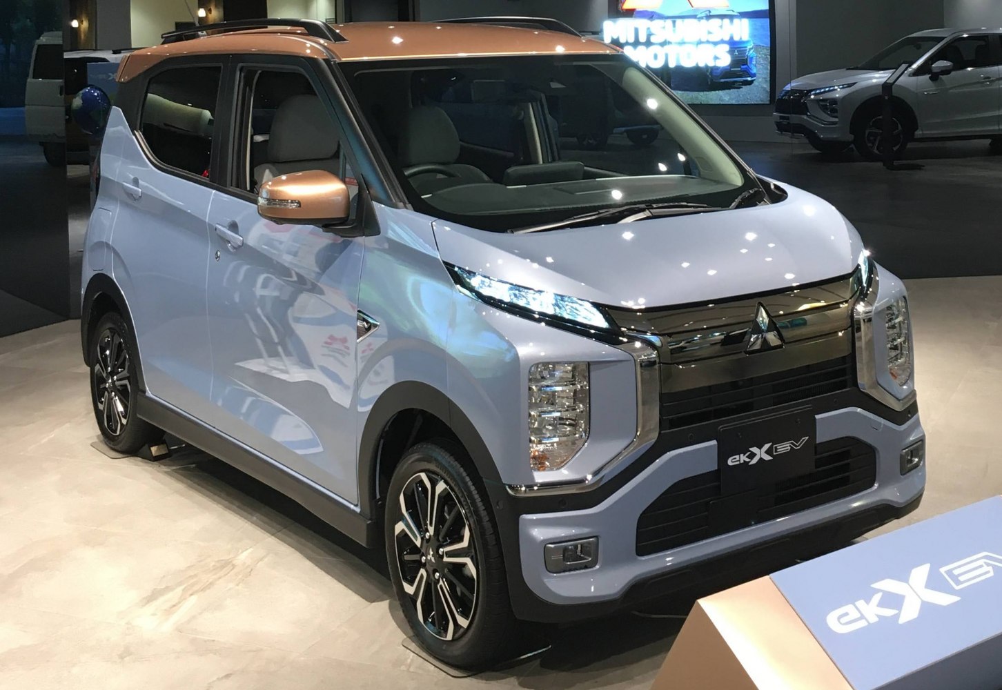 Front side view with LED headlights and compact SUV design