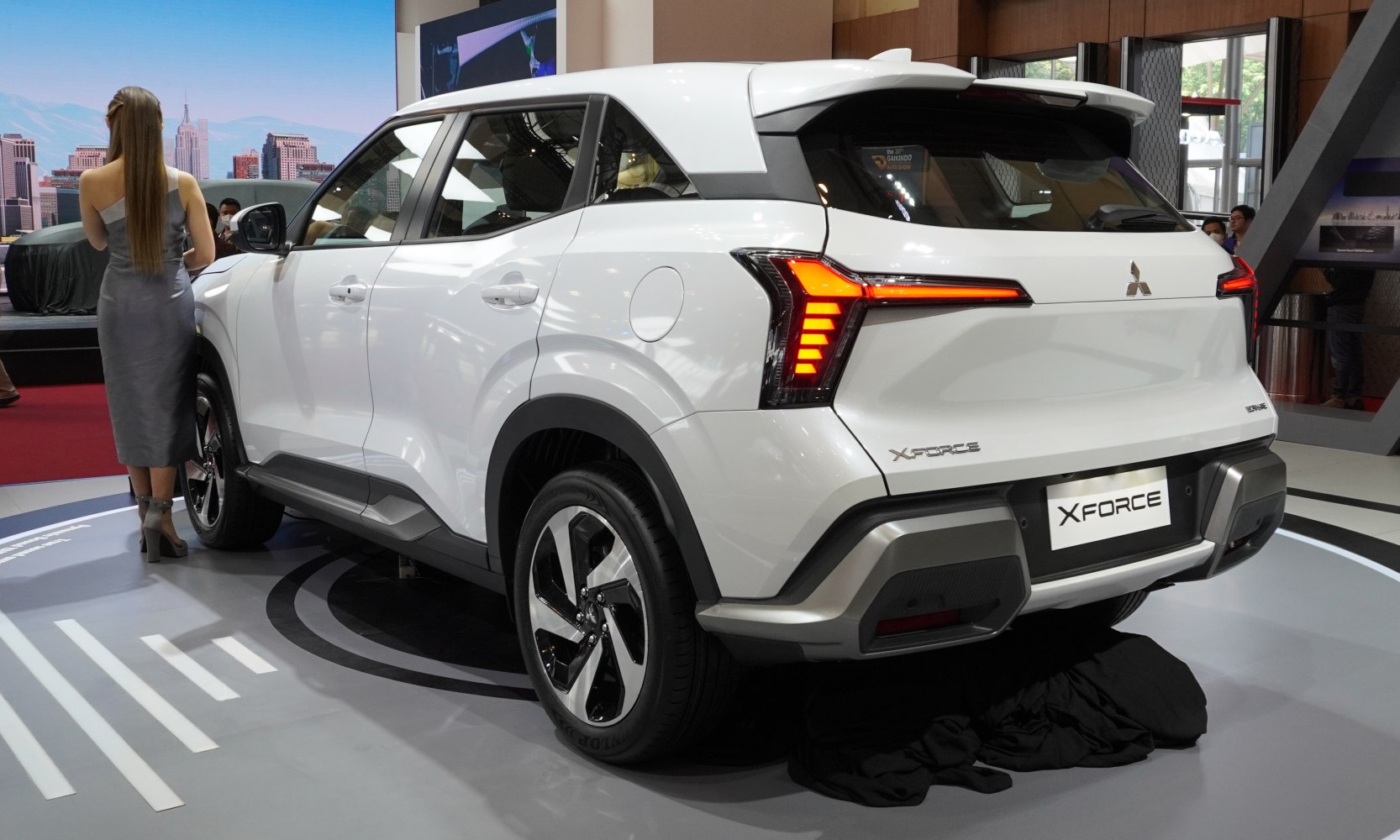 Rear view with futuristic LED tail lights and bold bumper design
