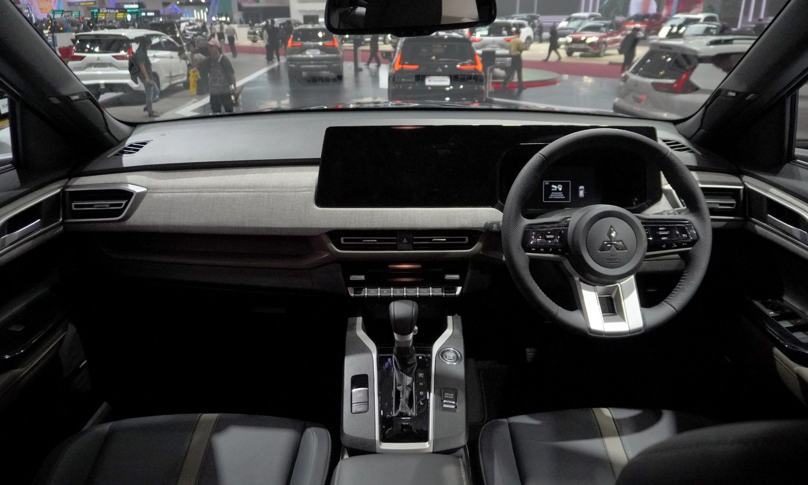 Modern dashboard with digital displays and multifunction steering wheel