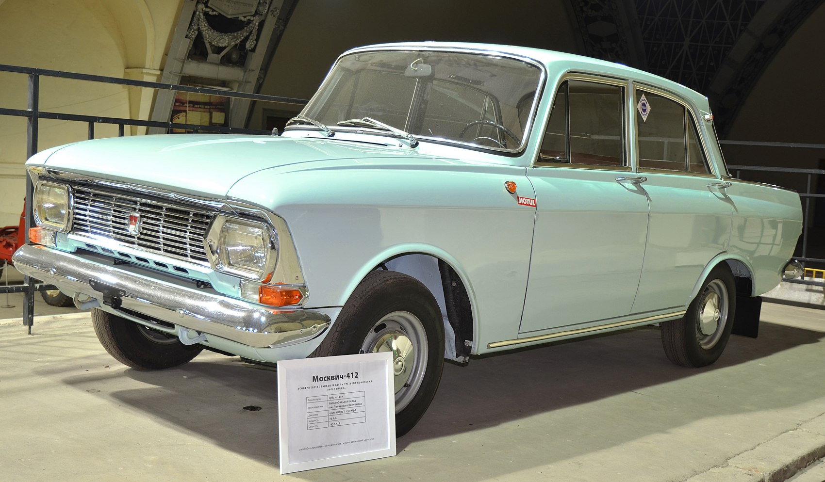 Front and side of vintage 1967 sedan with chrome grille and dual headlights