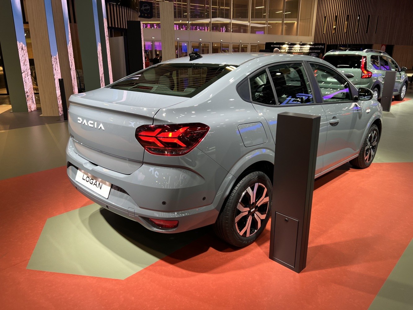 Rear and side view of sedan with distinctive LED taillights and modern wheels