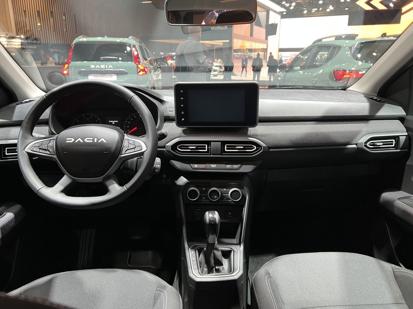 Modern facelift interior with touchscreen, multi-function steering wheel, and ergonomic dashboard