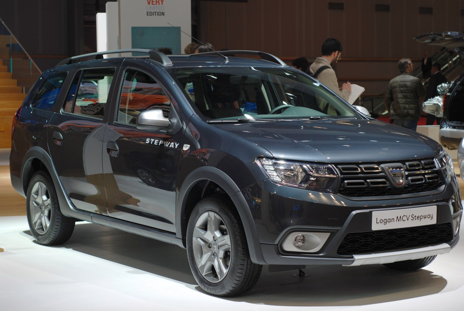 SUV-style wagon with roof rails, alloy wheels, and rugged exterior