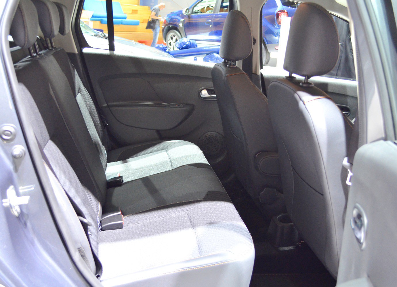 Rear seats and door panel interior of a compact car