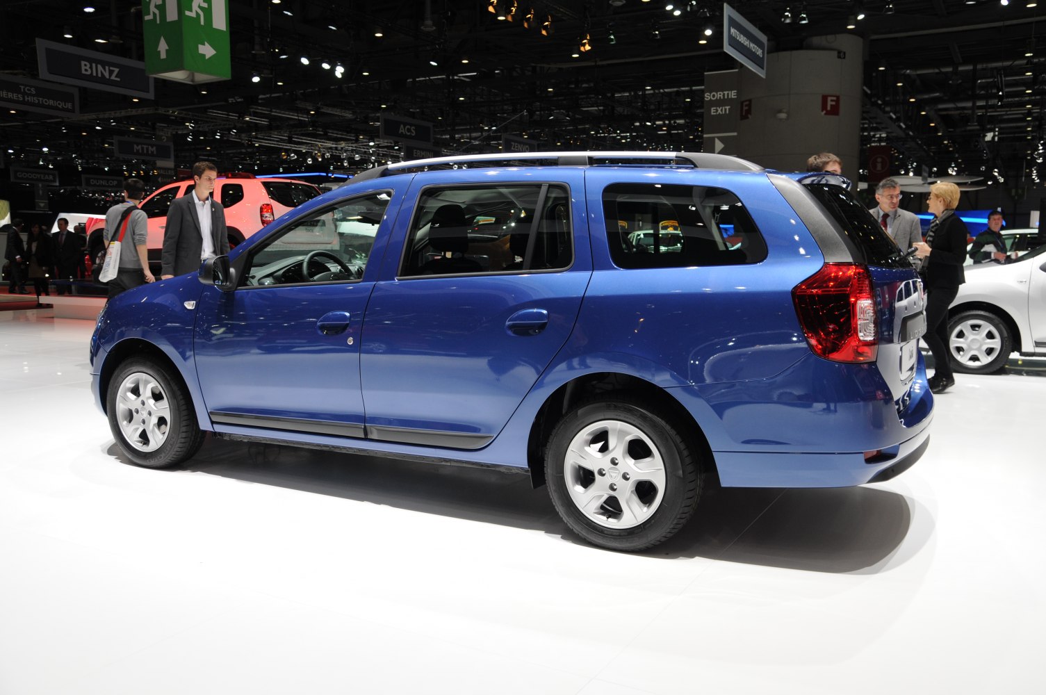 Blue compact five-door station wagon with roof rails.