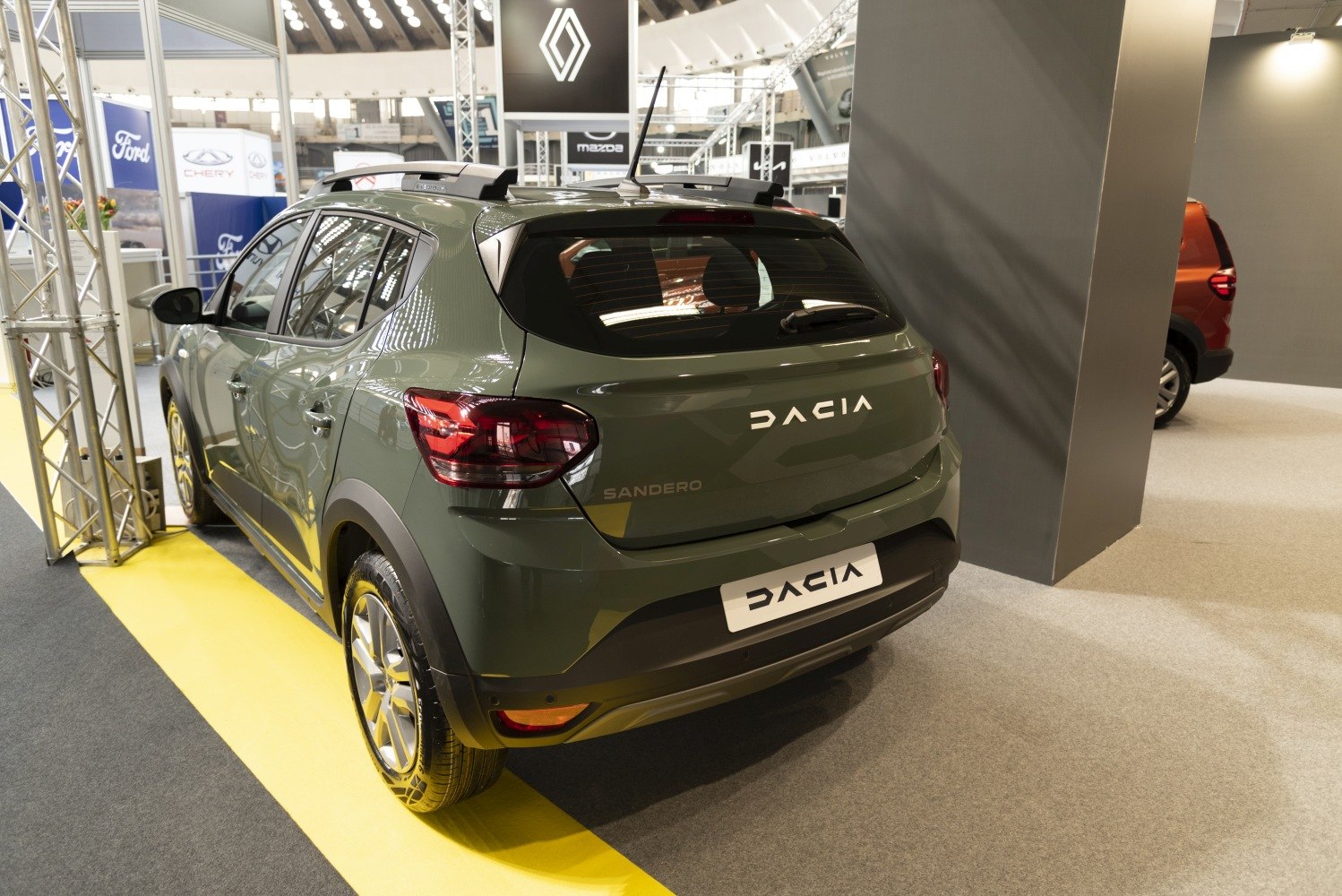 Rear view of hatchback with LED taillights and roof rails