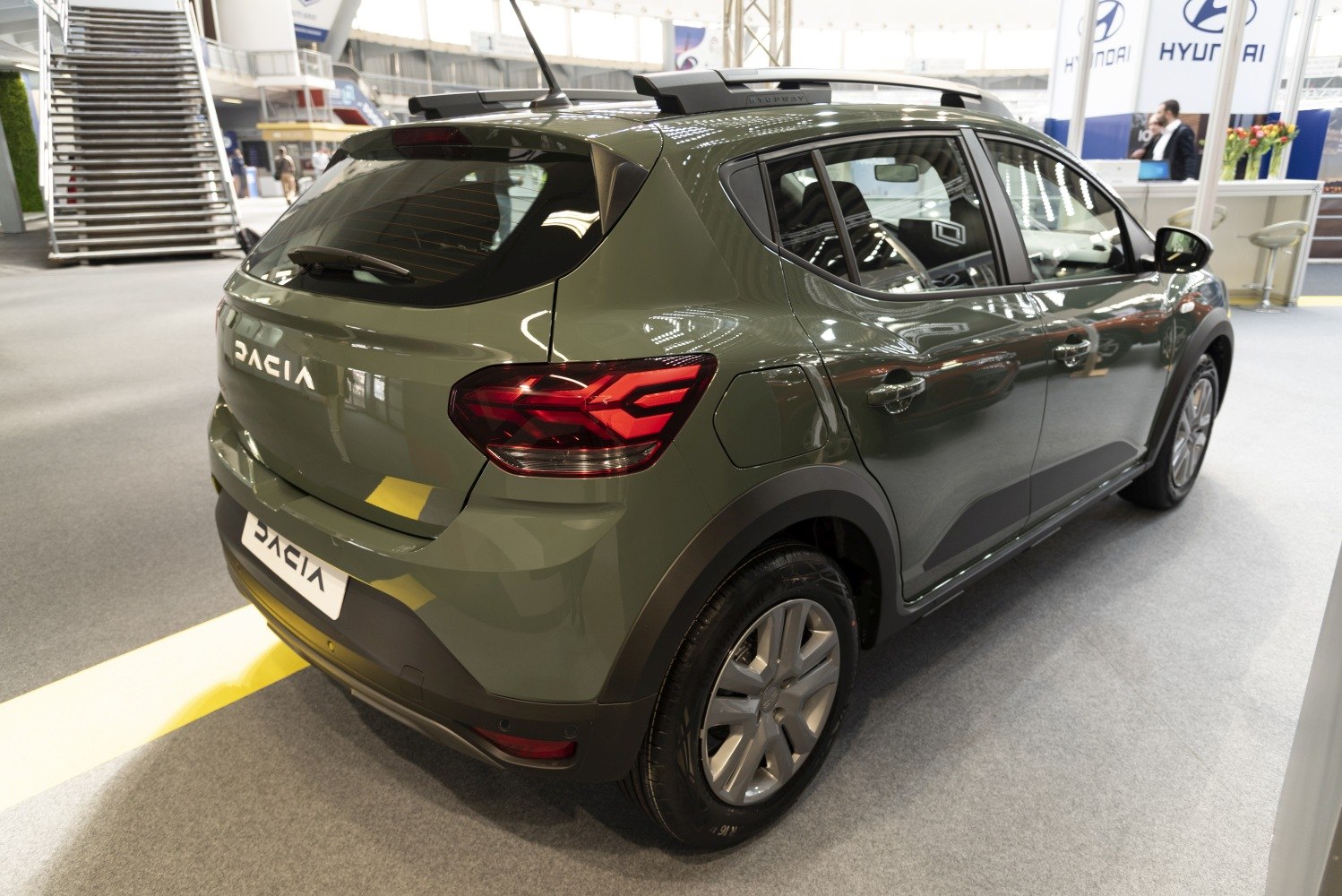 Rear and side view with modern taillights and roof rails