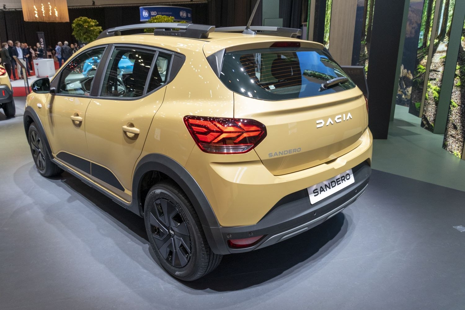Rear side view with modern taillights and black alloy wheels