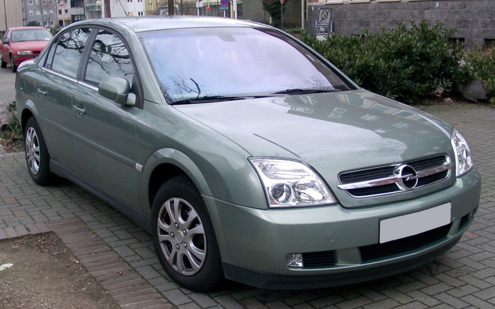 Front-side view with chrome grille and dual headlights