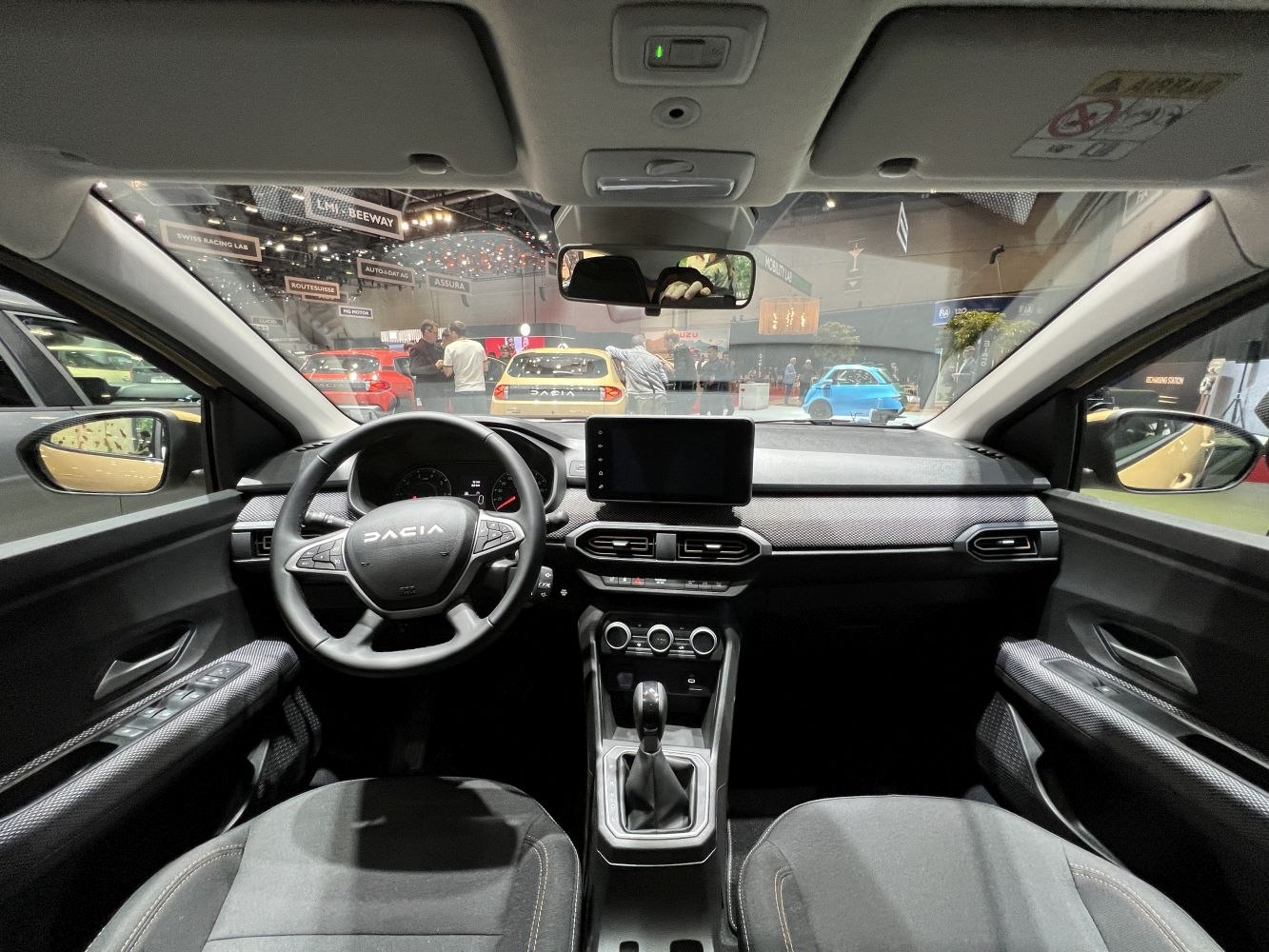 Interior dashboard with steering wheel and infotainment screen