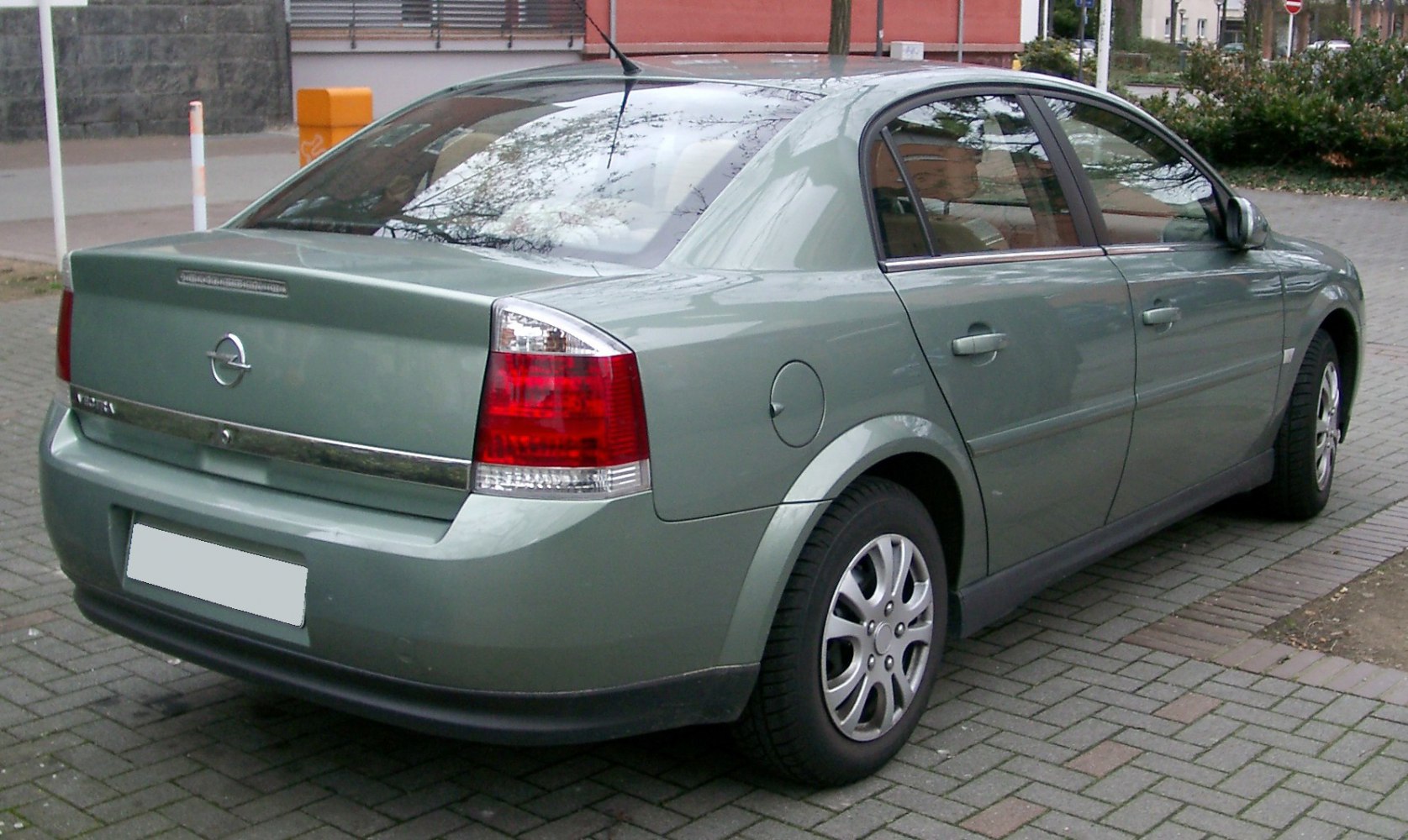 Rear and side view with distinct tail lights and smooth body shape