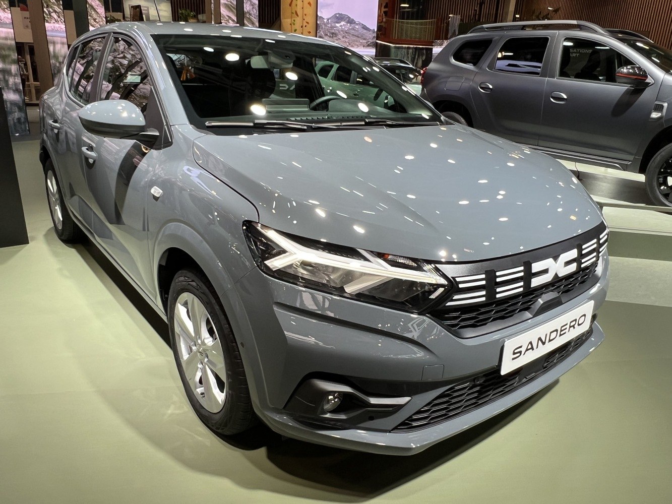 Front view of hatchback with LED lights and distinctive grille.